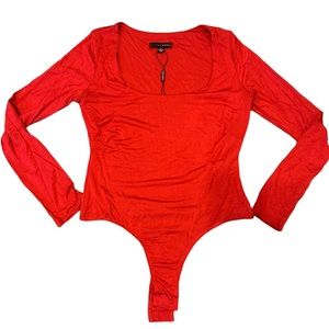 Brand new, J Lux Label body suit (never worn, tag attached).